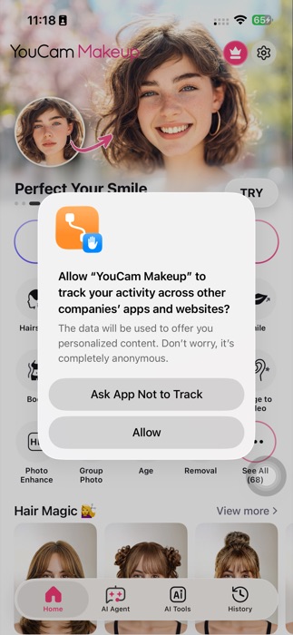 YouCam home grid — AI Wardrobe nằm cùng hàng với Face Retouch, Facelift, Age